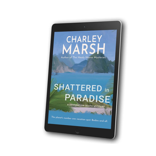 A tablet device displaying the book cover of 'Shattered in Paradise' by Charley Marsh, shown at an angle on a clean white background.